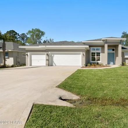 Buy this 3 bed house on 33 Woodbury Drive in Palm Coast, FL 32164