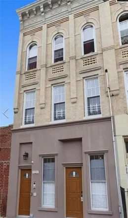 Buy this 9 bed townhouse on 920 Glenmore Avenue in New York, NY 11208