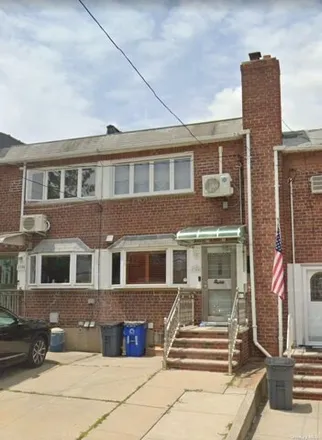 Buy this 3 bed townhouse on 13-04A 126th Street in New York, NY 11356
