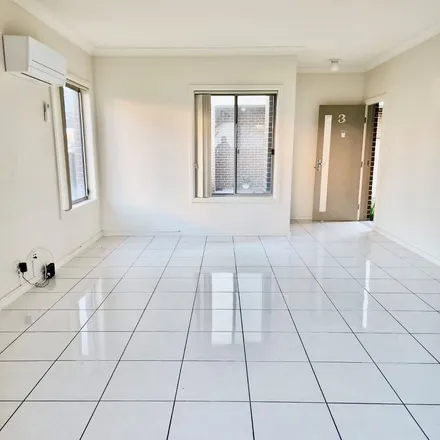 Rent this 3 bed townhouse on Market Street in Moorebank NSW 2170, Australia