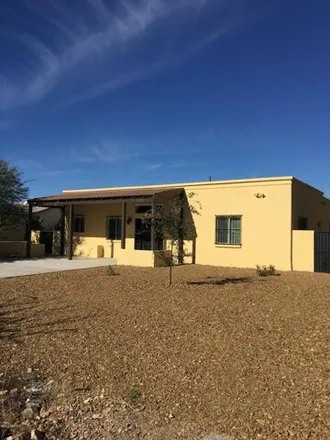 Rent this 3 bed house on 1773 East 10th Street in Tucson, AZ 85719
