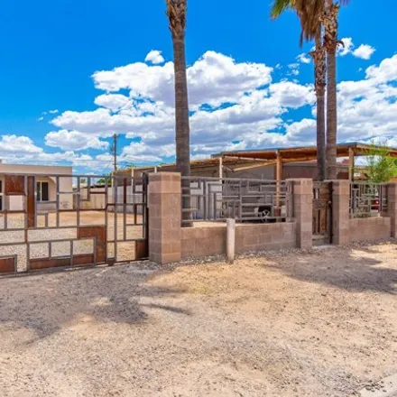 Buy this 4 bed house on 219 West Palmdale Street in Tucson, AZ 85714