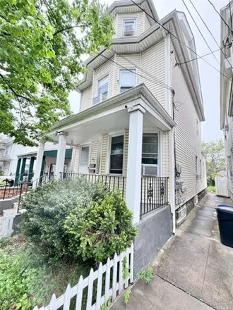 Buy this 4 bed house on 95-23 97th Avenue in New York, NY 11416