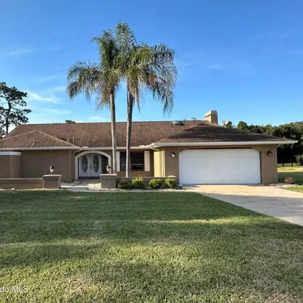 Rent this 3 bed house on 12447 Everard Drive in Spring Hill, FL 34609
