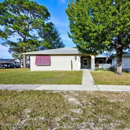 Buy this 4 bed house on 4363 Deltona Boulevard in Spring Hill, FL 34606