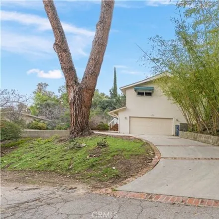 Rent this 4 bed house on 5059 Baza Avenue in Los Angeles, CA 91364