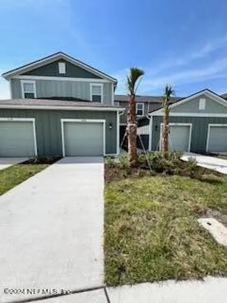 Rent this 3 bed townhouse on 9141 Cypress Green Drive in Jacksonville, FL 32256