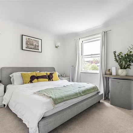 Rent this 2 bed townhouse on 29 Victoria Road in London, SW14 8EX
