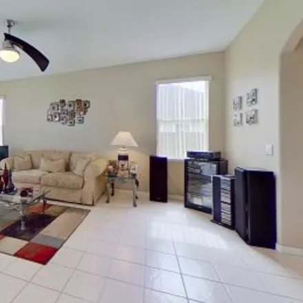 Rent this 4 bed apartment on 13837 Magnolia Glen Circle in Waterford Lakes East, Orlando