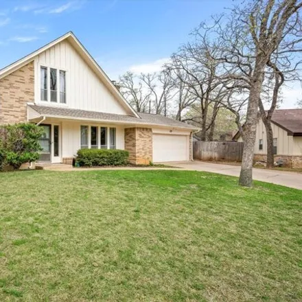 Buy this 4 bed house on 5799 Firewood Drive in Arlington, TX 76016