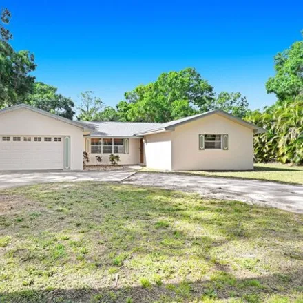 Buy this 3 bed house on 8613 Sheridan Road in West Melbourne, FL 32904