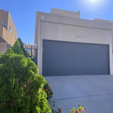 Buy this 3 bed townhouse on 4622 Via Macduffee Road Northeast in Oso Grande, Albuquerque