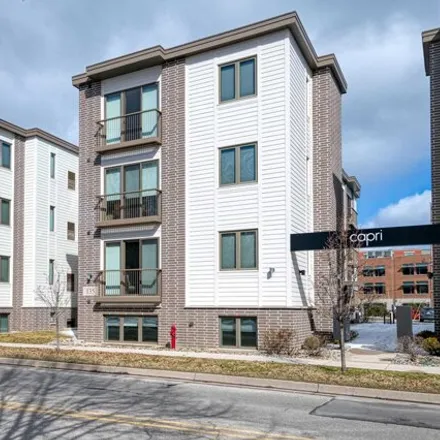 Image 3 - Old Town Parking Deck, 125 East Eighth Street, Traverse City, MI 49684, USA - Condo for sale