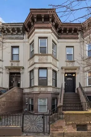 Buy this 6 bed townhouse on 154 Woodruff Avenue in New York, NY 11226