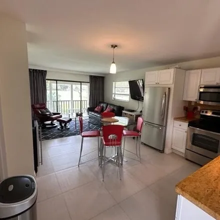 Rent this 1 bed condo on 713 Greensward Court in Sherwood Park, Delray Beach