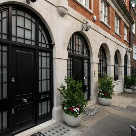 Rent this 4 bed townhouse on 18 Rex Place in London, W1K 2AQ