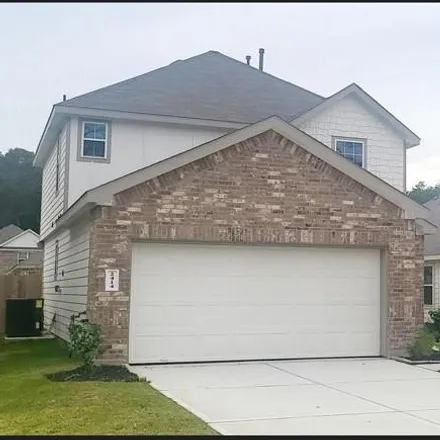 Rent this 4 bed house on Tavo Trails Dr in Conroe, TX