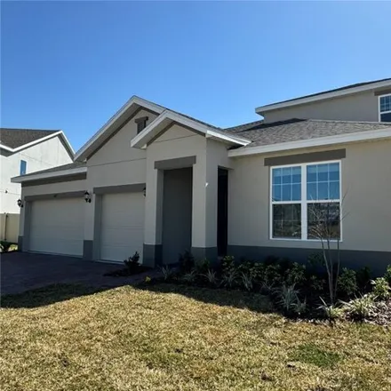 Buy this 5 bed house on Switchgrass Loop in Minneola, FL 32711