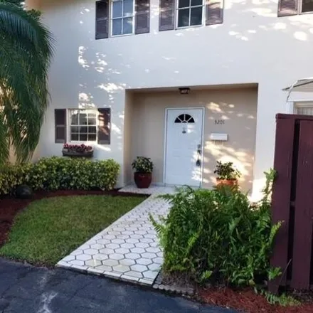Rent this 3 bed house on Palm Aire Country Club in 2600 North Palm Aire Drive, Pompano Beach