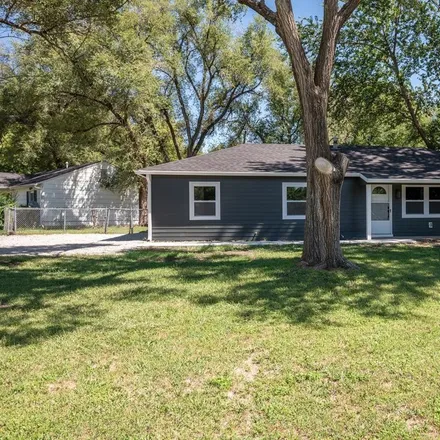 Buy this 4 bed house on 3434 Southwest Kirklawn Avenue in Topeka, KS 66611