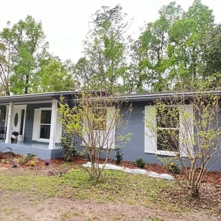 Buy this 4 bed house on 800 Northwest 60th Street in Alachua County, FL 32605