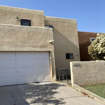 Rent this 3 bed townhouse on 9400 Osuna Place Northeast in Albuquerque, NM 87111