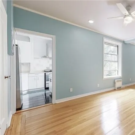 Buy this studio apartment on 37-28 85th Street in New York, NY 11372