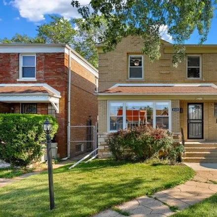 Buy this 3 bed house on 1509 East 86th Place in Chicago, IL 60617