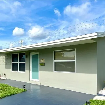 Rent this 3 bed house on 4693 Northeast 2nd Avenue in Brentwood Estates, Oakland Park