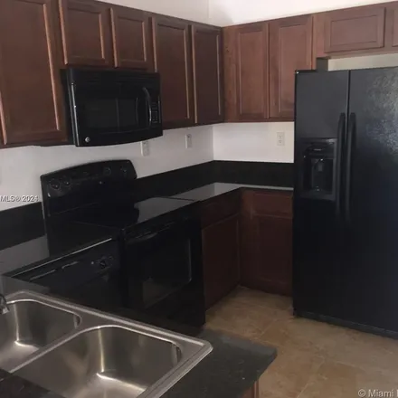Rent this 2 bed apartment on 8800 Northwest 107th Court in Doral, FL 33178