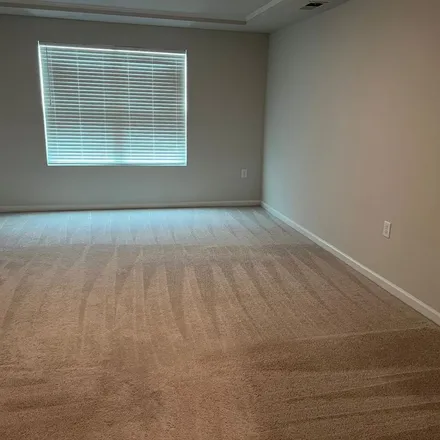 Rent this 3 bed apartment on Tura Street in Raleigh, NC 27620