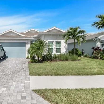 Rent this 4 bed house on 8941 Mustique Lane in Collier County, FL 34114