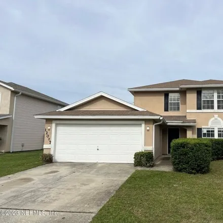 Buy this 5 bed house on 12027 Autumn Sunrise Drive in Jacksonville, FL 32246