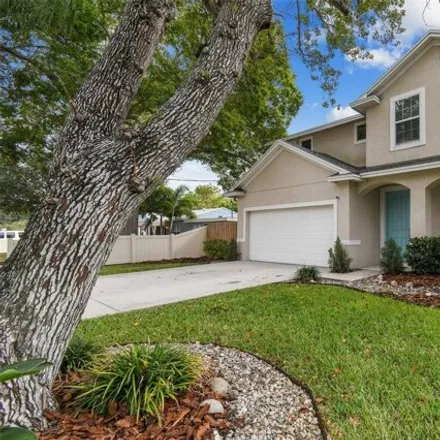 Buy this 4 bed house on 3078 West Meadow Street in Meadowlawn, Tampa