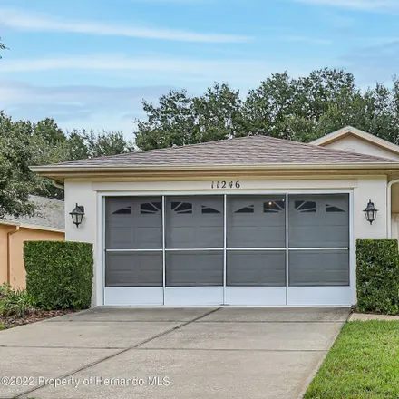Buy this 2 bed house on 11246 Heathrow Avenue in Spring Hill, FL 34609