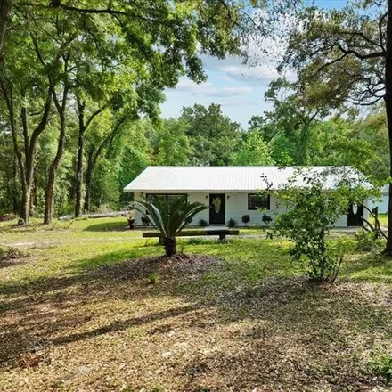 Buy this 3 bed house on 6596 Northwest 153rd Lane in Levy County, FL 32626