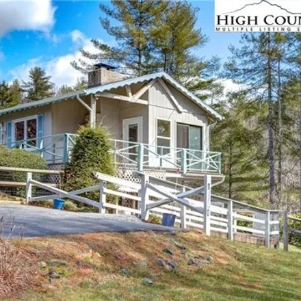 Buy this 4 bed house on 221 Forest Lake Lane in Ashe County, NC 28694