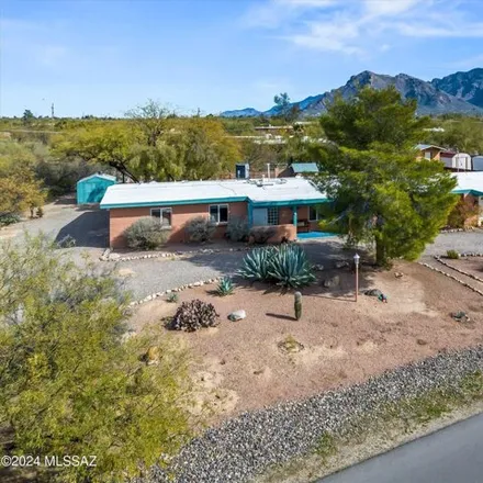Buy this 4 bed house on 1902 West Cassim Lane in Casas Adobes, AZ 85704