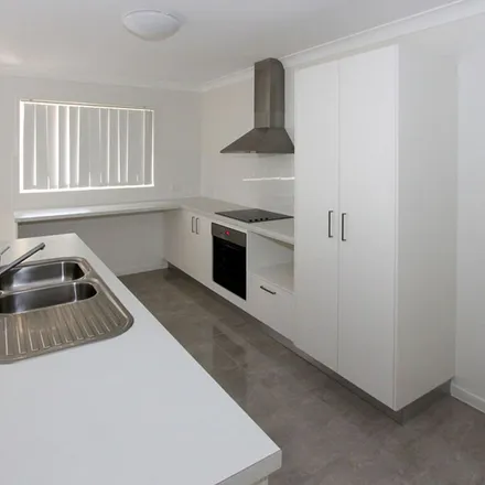 Rent this 4 bed apartment on Spoonbill Court in Lowood QLD, Australia