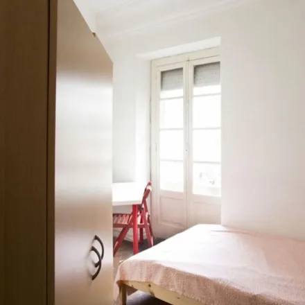 Rent this 7 bed room on Rua Passos Manuel