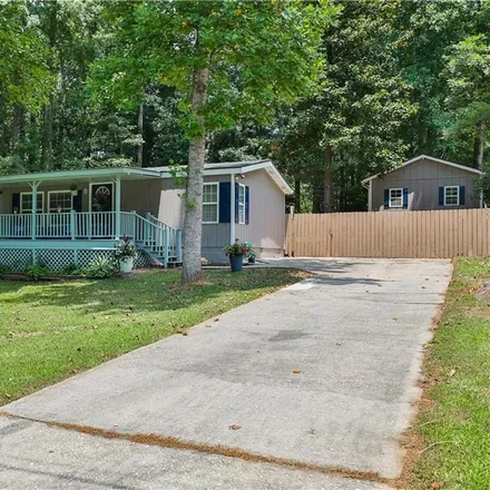 Buy this 3 bed house on 1645 Purcell Road Northwest in Gwinnett County, GA 30043