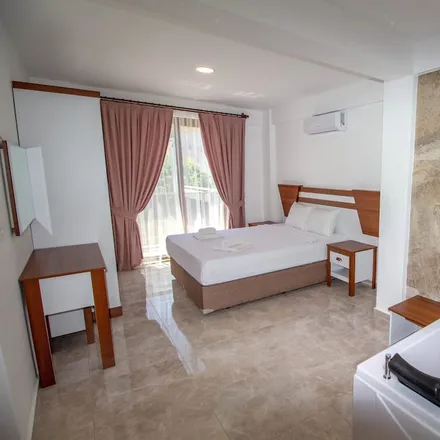 Rent this 4 bed house on Ovacık Caddesi in 48340 Fethiye, Turkey