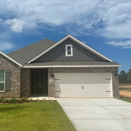 Buy this 4 bed house on 15663 Honey Cove Dr in Conroe, Texas