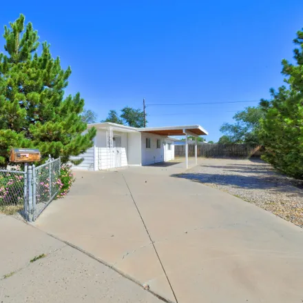 Buy this 4 bed house on 1425 San Andres Avenue Northwest in Albuquerque, NM 87107