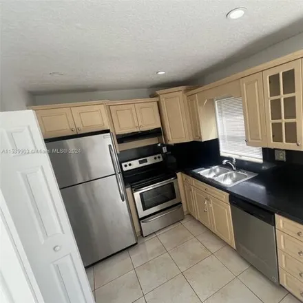 Rent this 2 bed townhouse on Kimberly Place in North Lauderdale, FL 33068