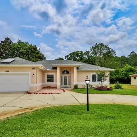 Buy this 3 bed house on 75 Walton Place in Palm Coast, FL 32164