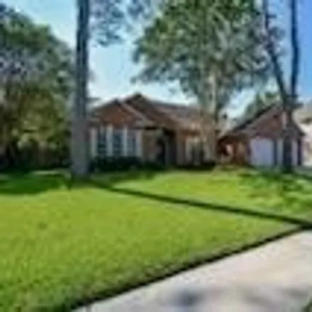 Rent this 4 bed house on 14879 Redwood Bend Trail in Houston, TX 77062