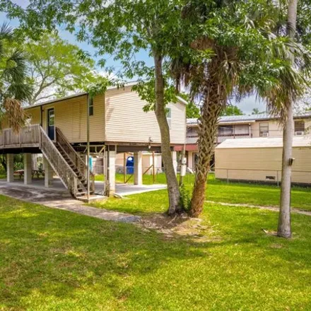 Buy this studio apartment on 6139 Island Drive in Hernando County, FL 34607