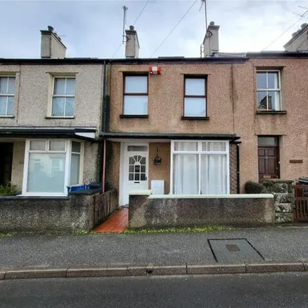 Buy this 2 bed townhouse on Porthdafarch Road in Penrhosfeilw, LL65 2QH