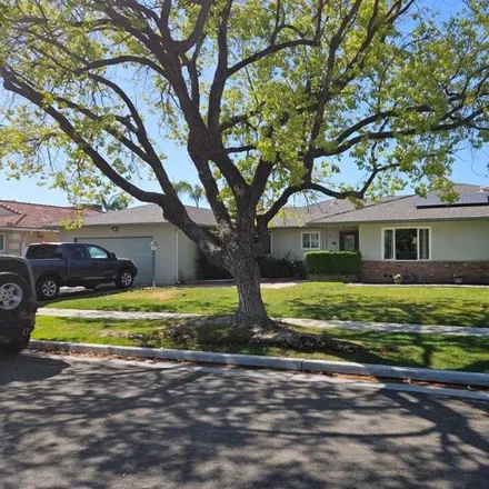 Buy this 4 bed house on 1703 East Sample Avenue in Fresno, CA 93710